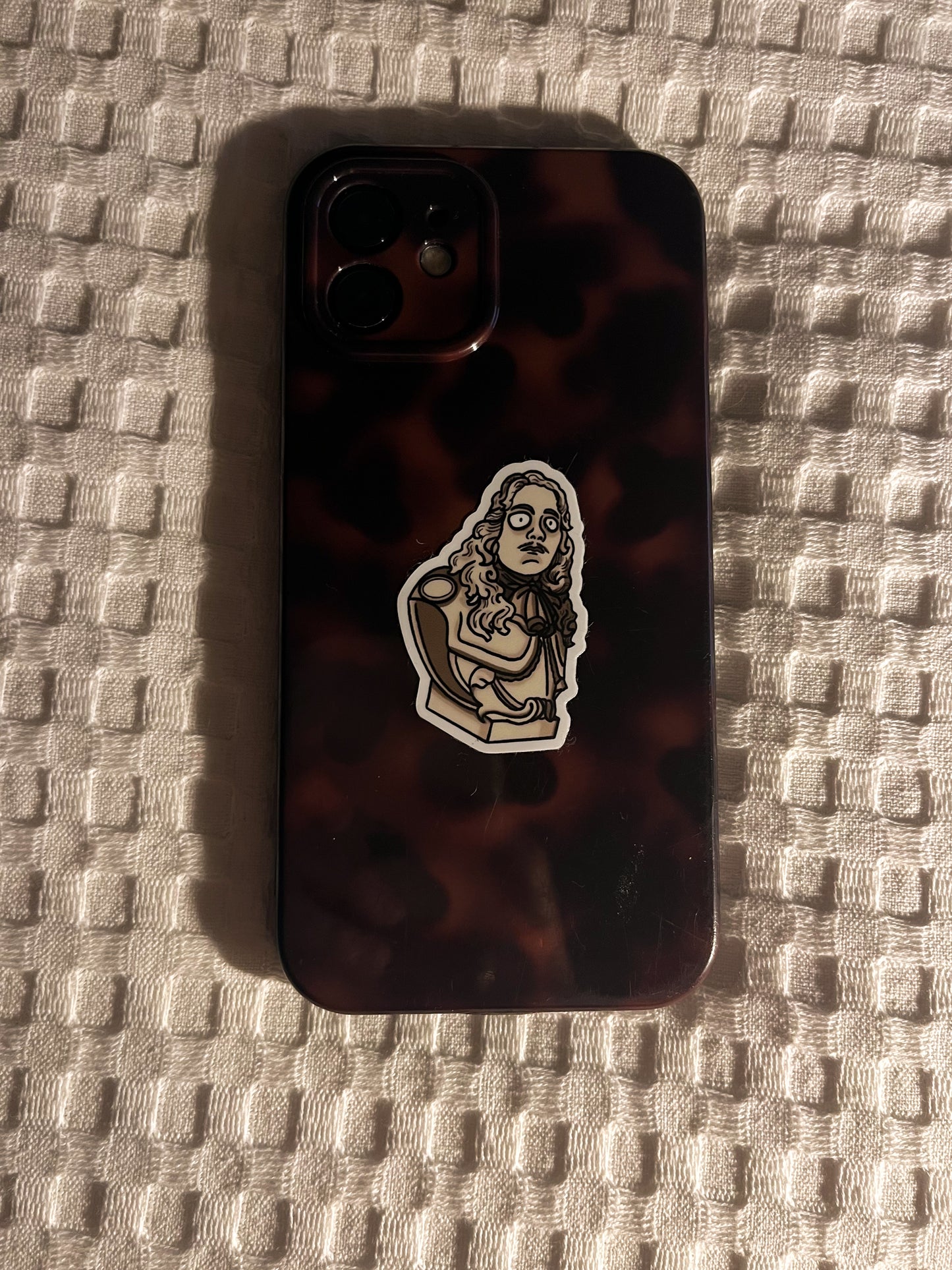 Bulging Eyes Statue Sticker